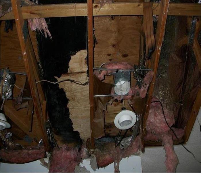 hanging debris from ceiling after a kitchen fire